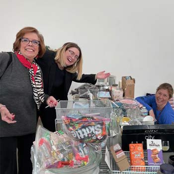 Smiling volunteers posing