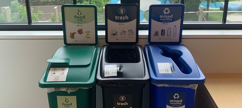 Trash, recycling, and compost bins in an MIT building